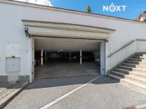 Prodej podílu garážového stání, Brno, Högrova, 11 m2