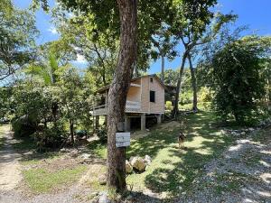 Prodej chaty, Coxen Hole, Roatán, Honduras, 464 m2