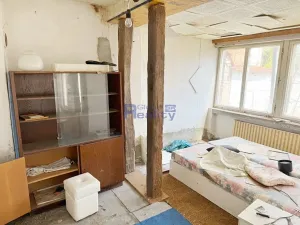 Prodej podílu pozemku pro bydlení, Pouzdřany, Hlavní, 902 m2